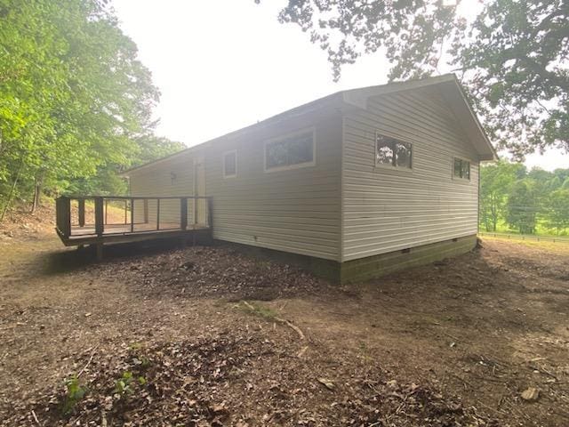 2517 Utility Rd, Rocky Face, GA 30740 - view of side of property featuring a wooden deck and crawl space