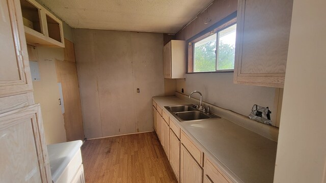 2517 Utility Rd, Rocky Face, GA 30740 - kitchen with a sink, light wood-style floors, light countertops, and a textured ceiling