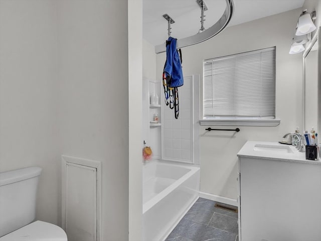 bathroom with toilet, vanity, washtub / shower combination, and tile patterned floors