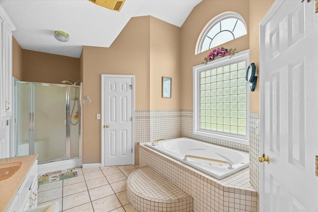 188 Valley Rd, Chatsworth, GA 30705 - full bath featuring a bath, a stall shower, vanity, and tile patterned floors