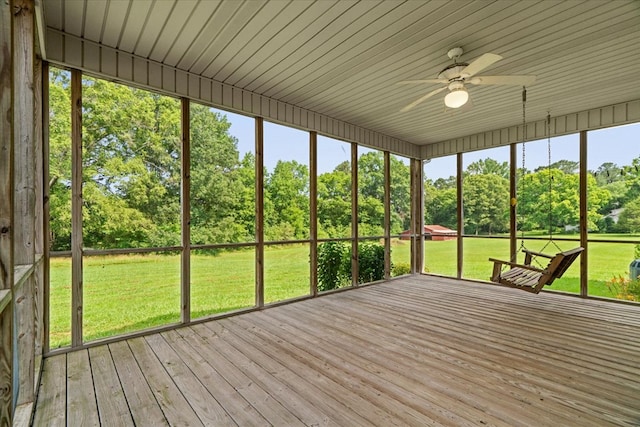 188 Valley Rd, Chatsworth, GA 30705 - unfurnished sunroom featuring a ceiling fan and view of scattered trees