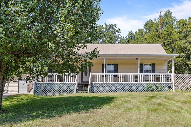 view of front of house with covered porch and a front lawn