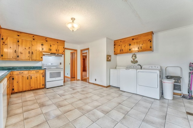 kitchen with washer and clothes dryer, light tile patterned floors, electric stove, and under cabinet range hood