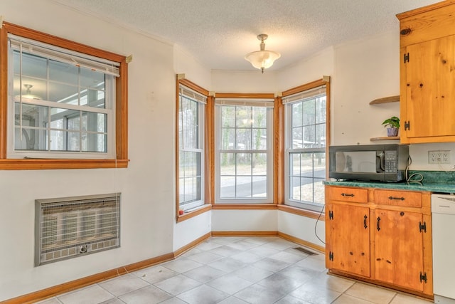 kitchen with visible vents, open shelves, heating unit, black microwave, and white dishwasher