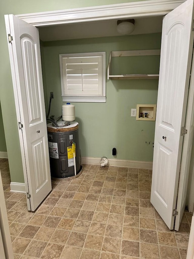 washroom with hookup for a washing machine, electric dryer hookup, and electric water heater