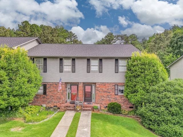 1962 Meadowbrook Cir, Dalton, GA 30720 - view of front facade featuring a front lawn, brick siding, and crawl space
