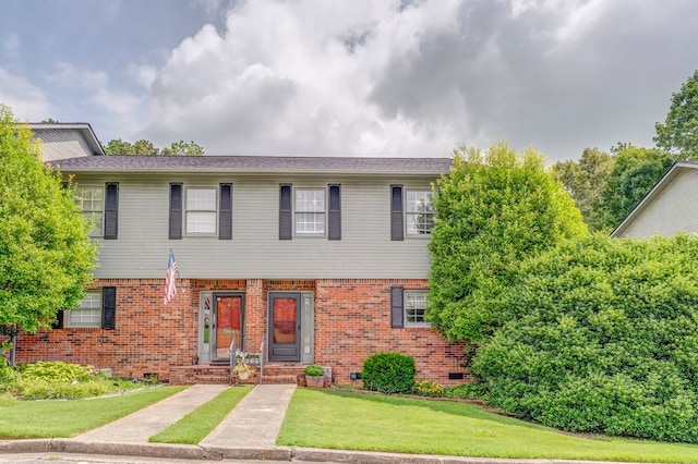 1962 Meadowbrook Cir, Dalton, GA 30720 - view of front of house with brick siding, a front yard, and crawl space