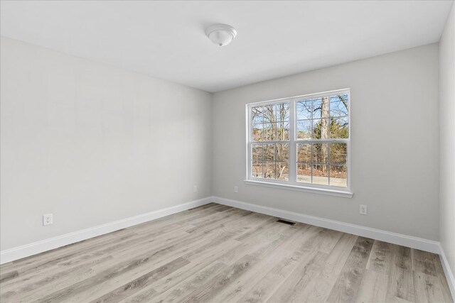 519 Abigail St, Dalton, GA 30721 - spare room featuring wood finished floors and baseboards