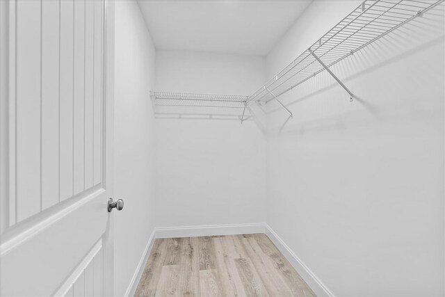 519 Abigail St, Dalton, GA 30721 - spacious closet featuring light wood-style flooring