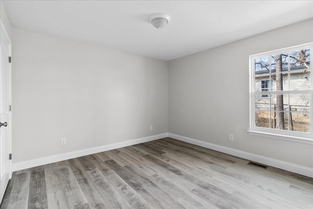 519 Abigail St, Dalton, GA 30721 - spare room with wood finished floors and baseboards