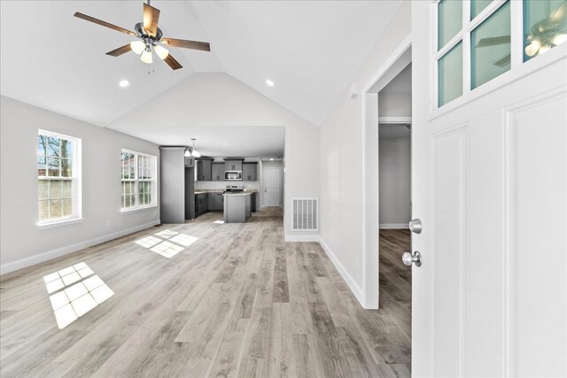 519 Abigail St, Dalton, GA 30721 - unfurnished living room featuring a ceiling fan, lofted ceiling, light wood finished floors, baseboards, and recessed lighting