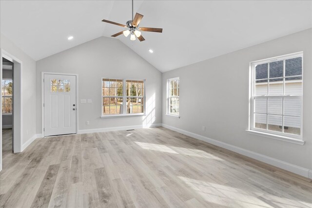 519 Abigail St, Dalton, GA 30721 - unfurnished living room featuring ceiling fan, healthy amount of natural light, high vaulted ceiling, light wood-style floors, and baseboards