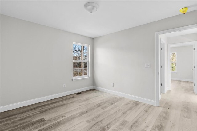 519 Abigail St, Dalton, GA 30721 - unfurnished room featuring baseboards and light wood-style flooring