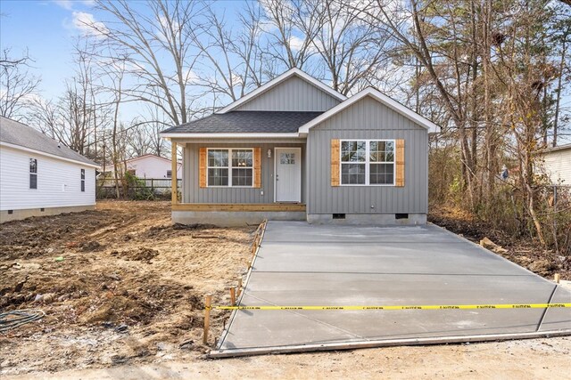 519 Abigail St, Dalton, GA 30721 - view of front of property featuring crawl space, a porch, a shingled roof, and board and batten siding