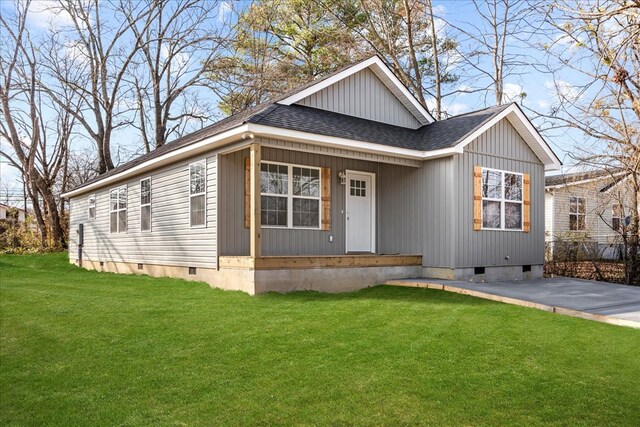519 Abigail St, Dalton, GA 30721 - view of front of house featuring covered porch, crawl space, roof with shingles, and a front lawn