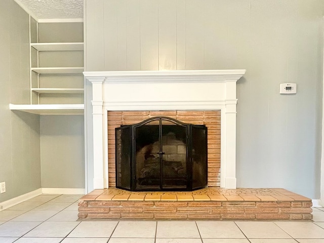 interior details with built in features and a textured ceiling