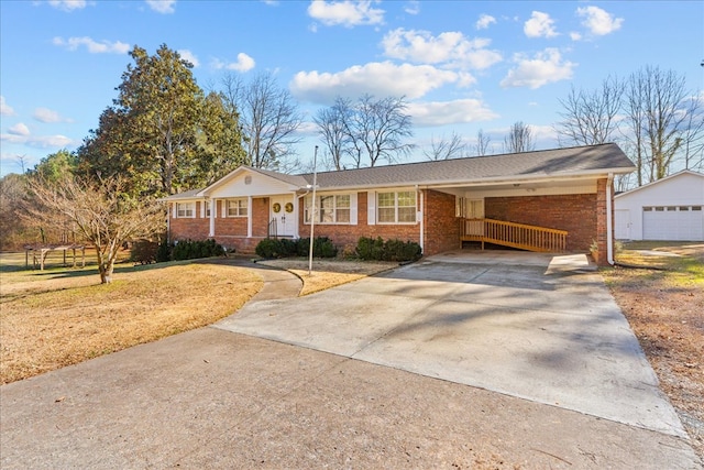 ranch-style home with a front yard and a carport