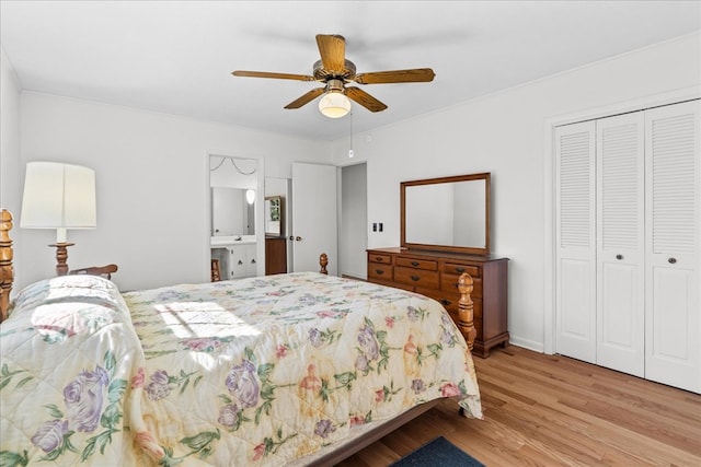 bedroom with light hardwood / wood-style flooring, a closet, and ceiling fan