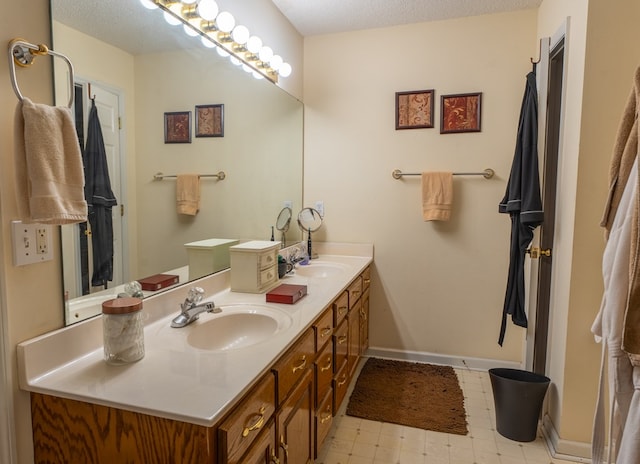 639 Mount View Dr, Tunnel Hill, GA 30755 - full bathroom featuring double vanity, baseboards, and tile patterned floors