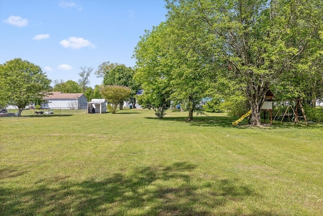 225 Shawn Ln, Chatsworth, GA 30705 - view of yard with a storage unit and an outbuilding