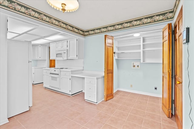 608 Brookview Ln, Dalton, GA 30720 - kitchen with white appliances, light countertops, white cabinetry, light tile patterned floors, and baseboards