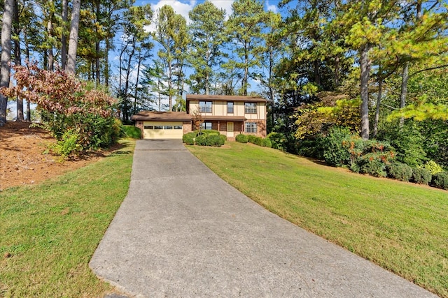 608 Brookview Ln, Dalton, GA 30720 - view of front facade featuring a front yard, driveway, and brick siding