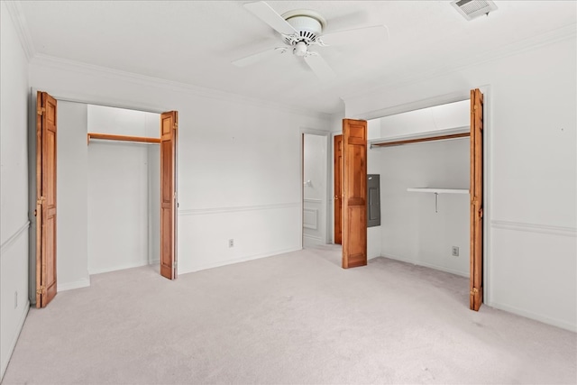 608 Brookview Ln, Dalton, GA 30720 - unfurnished bedroom with crown molding, light colored carpet, a ceiling fan, and multiple closets