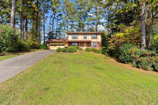 608 Brookview Ln, Dalton, GA 30720 - view of front of property with a garage, a front yard, driveway, and brick siding