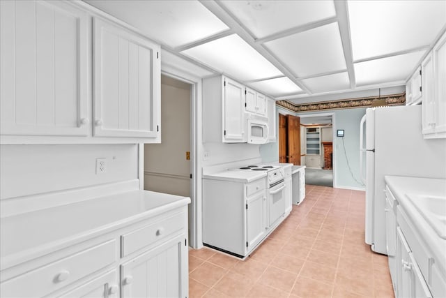 608 Brookview Ln, Dalton, GA 30720 - kitchen with white appliances, light countertops, white cabinets, and light tile patterned flooring