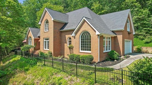 2001 Eagle Point Dr, Dalton, GA 30720 - view of front of property featuring roof with shingles, driveway, an attached garage, and brick siding