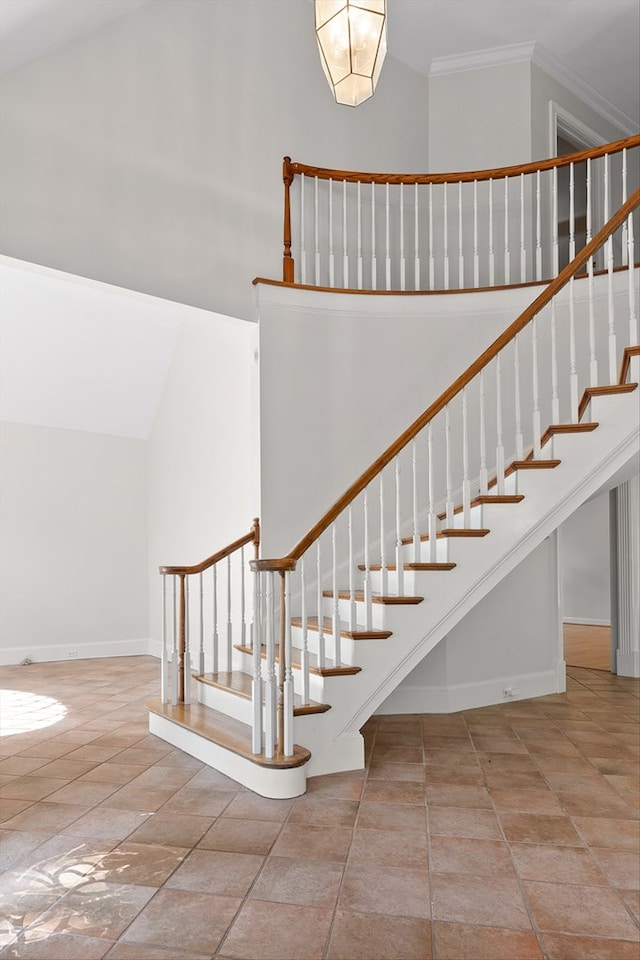 2001 Eagle Point Dr, Dalton, GA 30720 - stairs featuring baseboards, ornamental molding, and a high ceiling