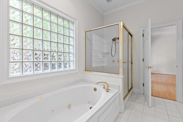 2001 Eagle Point Dr, Dalton, GA 30720 - bathroom with a tub with jets, tile patterned floors, a stall shower, ornamental molding, and baseboards
