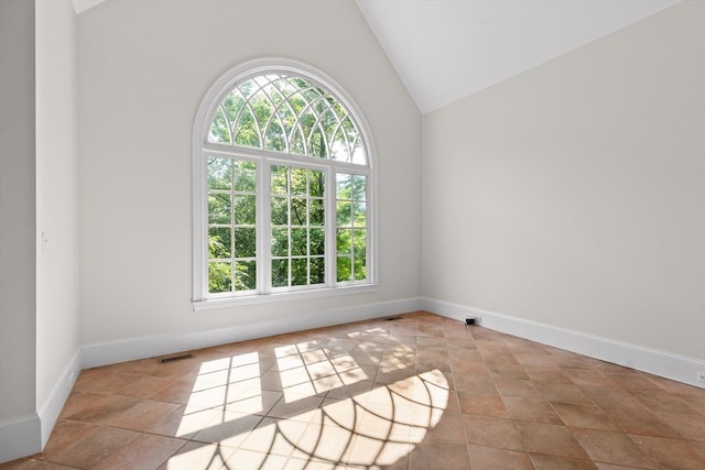 2001 Eagle Point Dr, Dalton, GA 30720 - empty room with baseboards and high vaulted ceiling