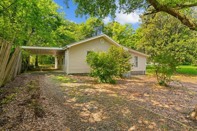 1098 Mount Vernon Rd, Tunnel Hill, GA 30755 - view of side of property with a carport and driveway