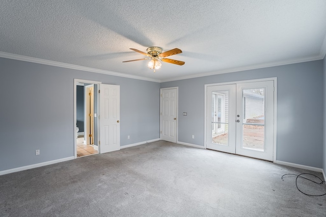 carpeted spare room featuring crown molding, french doors, baseboards, and ceiling fan