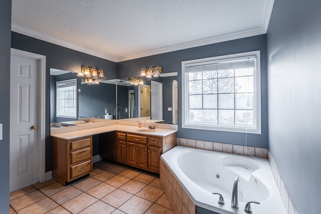 full bathroom featuring a textured ceiling, a jetted tub, ornamental molding, and vanity