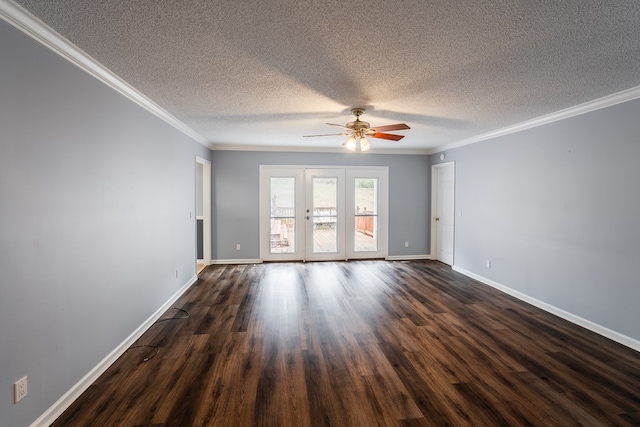 spare room featuring ornamental molding, a ceiling fan, a textured ceiling, dark wood finished floors, and baseboards