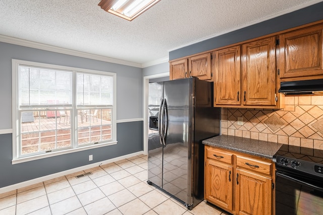 kitchen featuring ornamental molding, black electric range, exhaust hood, dark countertops, and refrigerator with ice dispenser