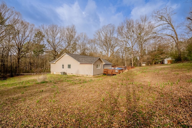 view of yard with a wooden deck