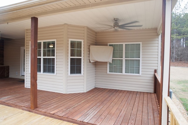 wooden terrace featuring ceiling fan