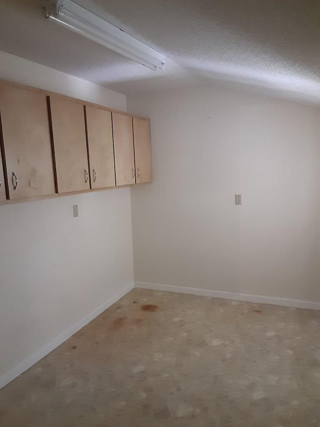 interior space featuring a textured ceiling