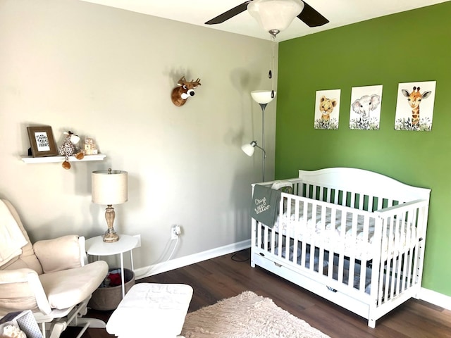 41 Magnolia Ct, Rydal, GA 30171 - bedroom with wood finished floors, a nursery area, and a ceiling fan