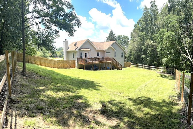 41 Magnolia Ct, Rydal, GA 30171 - back of property featuring a deck, a fenced backyard, a chimney, and stairway