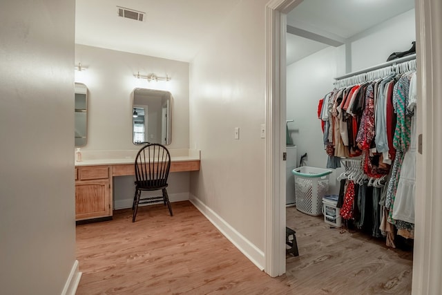 bathroom featuring vanity and hardwood / wood-style flooring