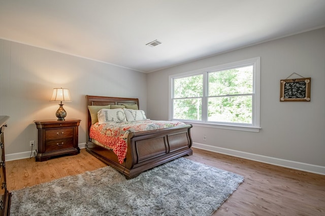 bedroom featuring hardwood / wood-style flooring