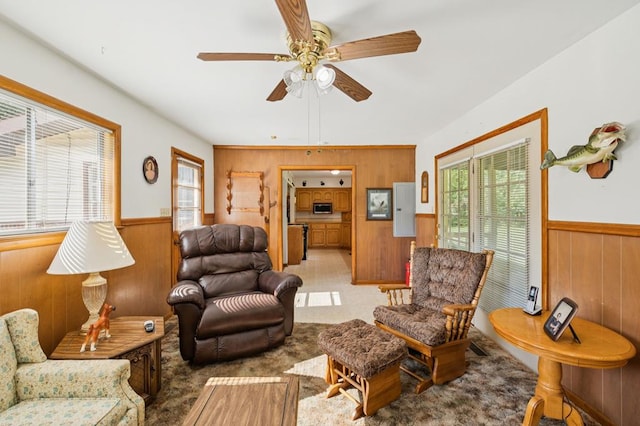 183 Long Hollow Rd, Rock Spring, GA 39736 - carpeted living area with wooden walls, wainscoting, and ceiling fan
