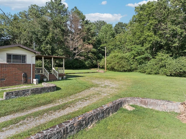 183 Long Hollow Rd, Rock Spring, GA 39736 - view of grassy yard featuring covered porch