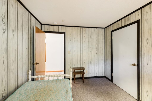 183 Long Hollow Rd, Rock Spring, GA 39736 - carpeted bedroom featuring ornamental molding and wooden walls