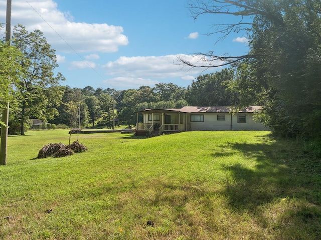 183 Long Hollow Rd, Rock Spring, GA 39736 - view of grassy yard with a sunroom