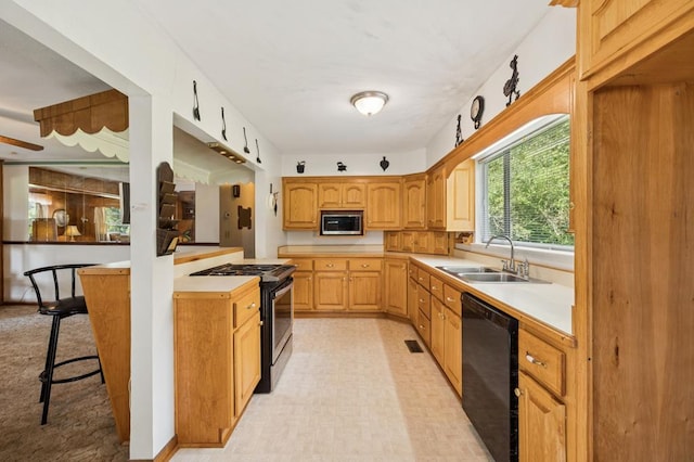 183 Long Hollow Rd, Rock Spring, GA 39736 - kitchen featuring stainless steel appliances, light countertops, and a breakfast bar